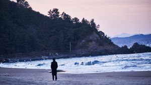 On the Beach at Night Alone's poster