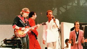 Dire Straits at Live Aid's poster