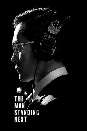 The Man Standing Next's poster