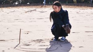 On the Beach at Night Alone's poster