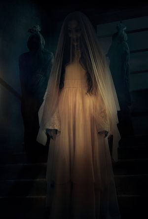 Satan's Slaves 2: Communion's poster