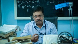 Maayavan's poster