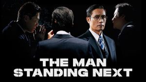 The Man Standing Next's poster