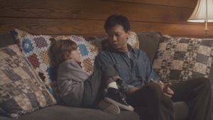 In the Family's poster