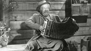 The Host Who Plays the Accordian's poster