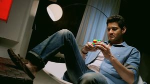 1: Nenokkadine's poster