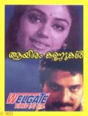 Aayiram Kannukal's poster