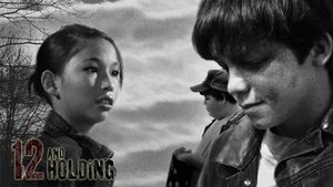 12 and Holding's poster