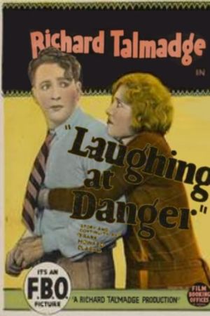 Laughing at Danger's poster