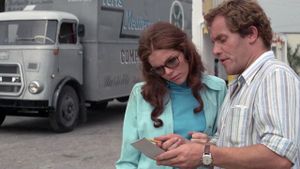 The Lady in the Car with Glasses and a Gun's poster