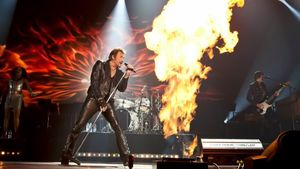Johnny Hallyday Allume le feu au Stade de France's poster