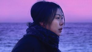 On the Beach at Night Alone's poster