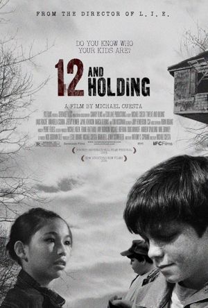 12 and Holding's poster