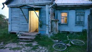 House near the road's poster