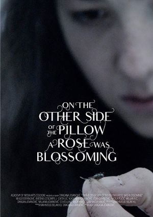 On the Other Side of the Pillow a Rose Was Blossoming's poster image