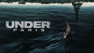 Under Paris's poster
