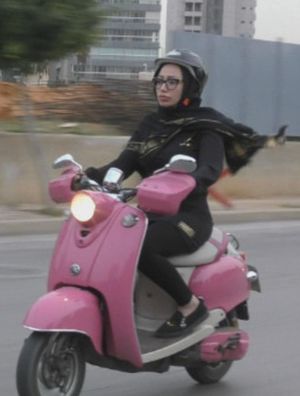 Zeinab on the Scooter's poster