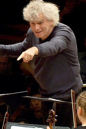 In rehearsal: Simon Rattle conducts 6 Berlin school orchestras's poster