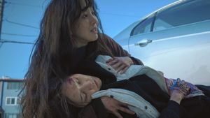 The Woman in the White Car's poster