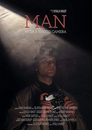 Man with a photo camera's poster