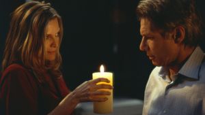 What Lies Beneath's poster