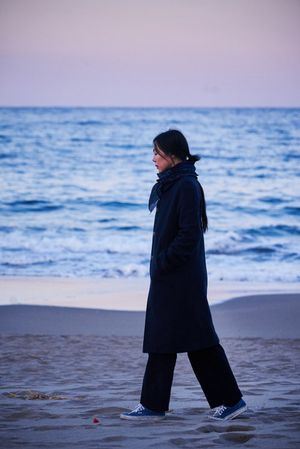 On the Beach at Night Alone's poster