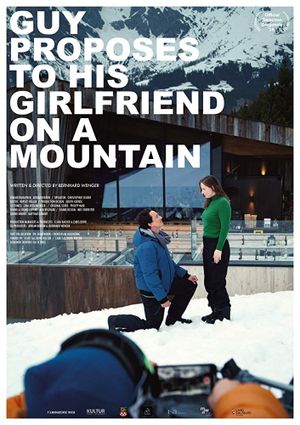 Guy Proposes To His Girlfriend On A Mountain's poster