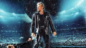 Johnny Hallyday Allume le feu au Stade de France's poster