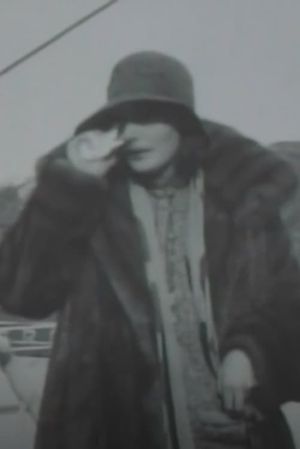 With Greta Garbo on the Swedish American Line's Ship's poster