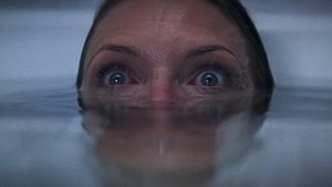 What Lies Beneath's poster