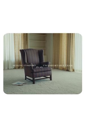 Seeking Comfort In An Uncomfortable Chair's poster image