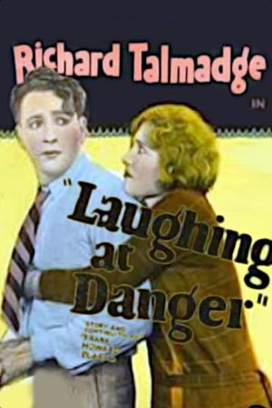 Laughing at Danger's poster