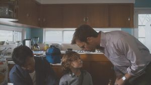 In the Family's poster